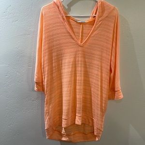 Bright Orange with a hood. Size Large.